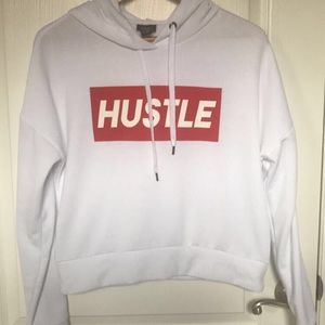 Sweatshirt that says hustle on the front.